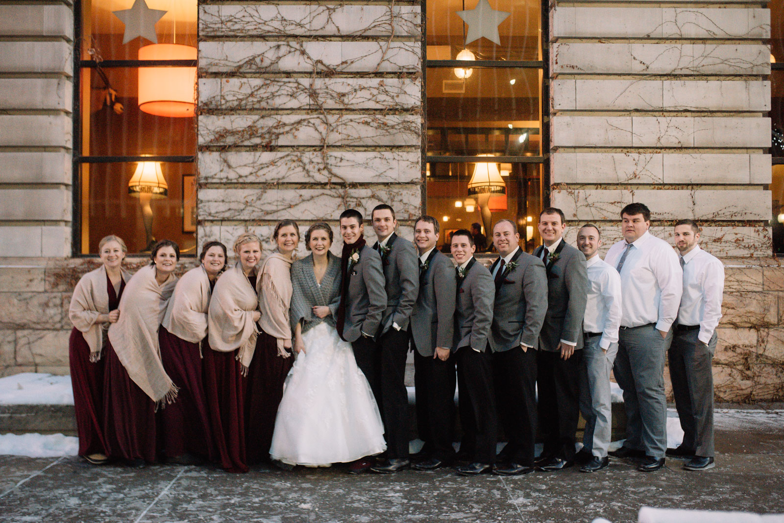 bridal party downtown cedar rapids winter wedding