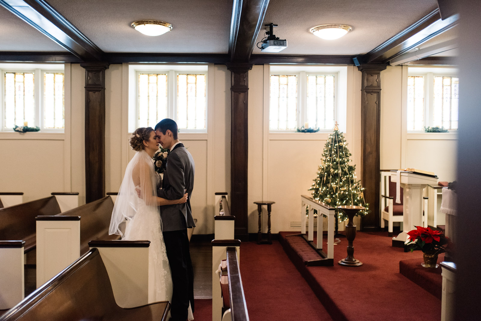 bride and groom first look cedar rapids winter wedding