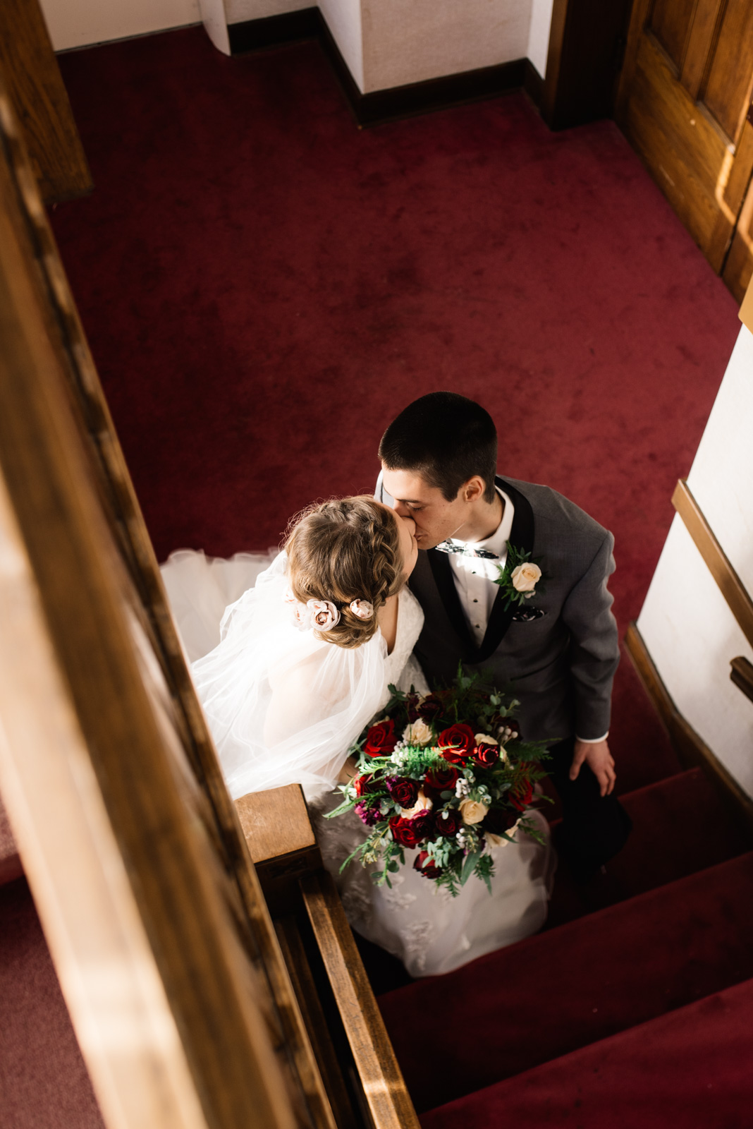 bride and groom kissing St. Paul's United Methodist Church Wedding