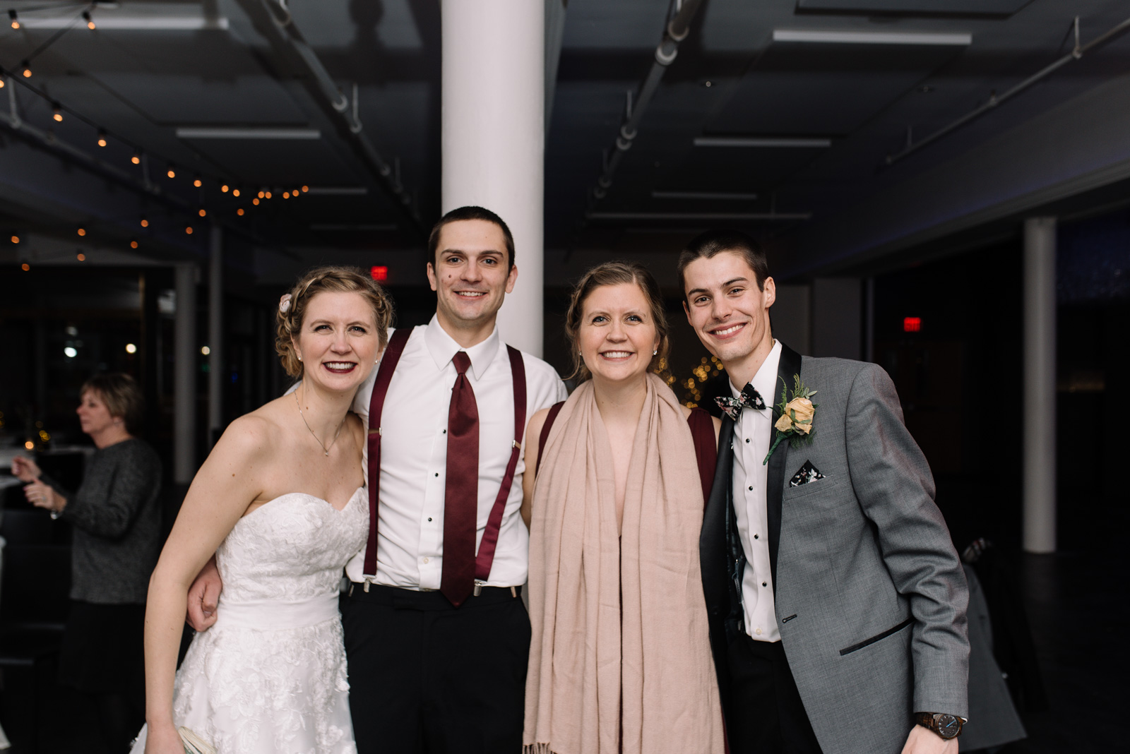 bride and groom with best man and maid of honor eastbank wedding venue