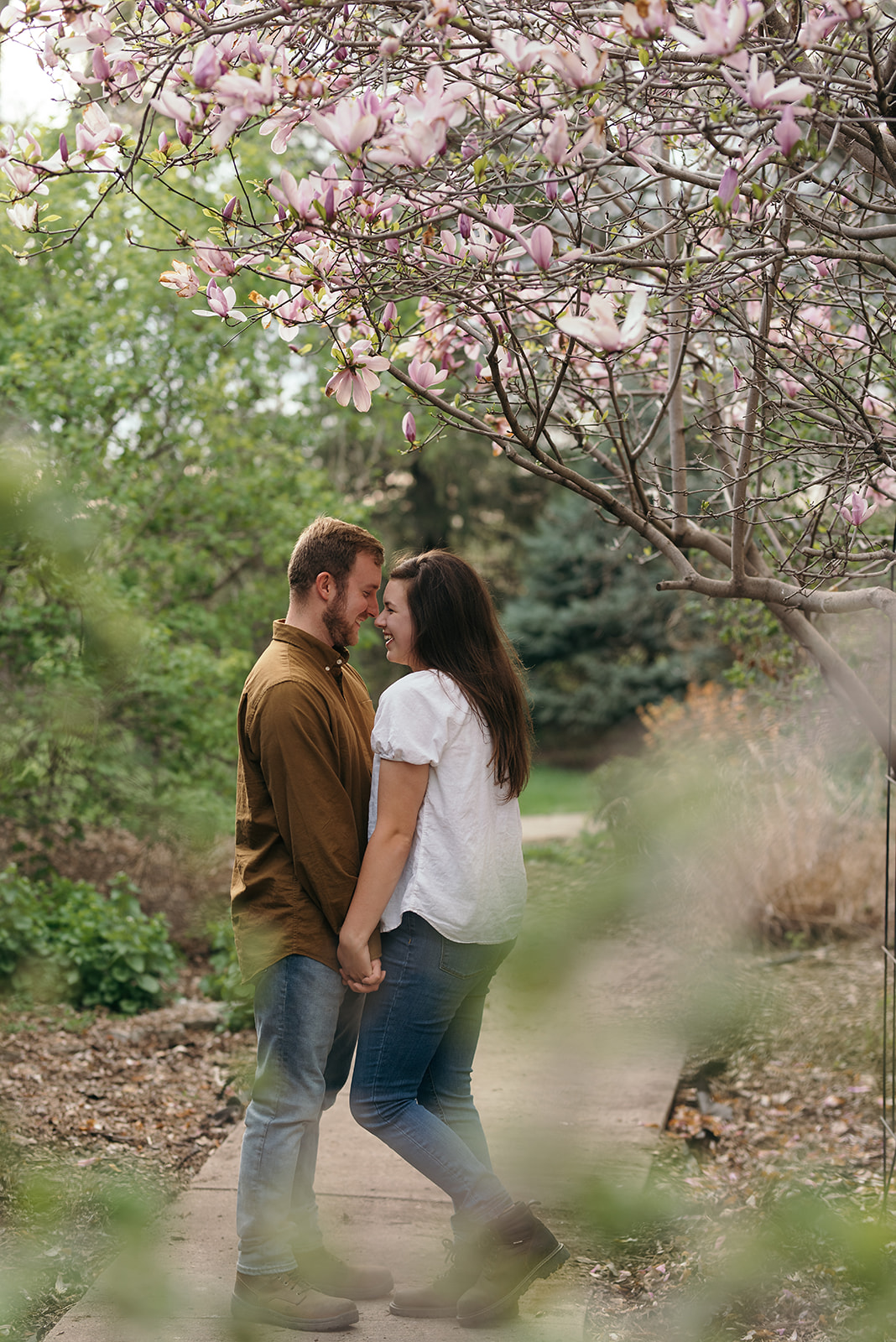 couple-holding-hands-wellman-iowa-engagement-session