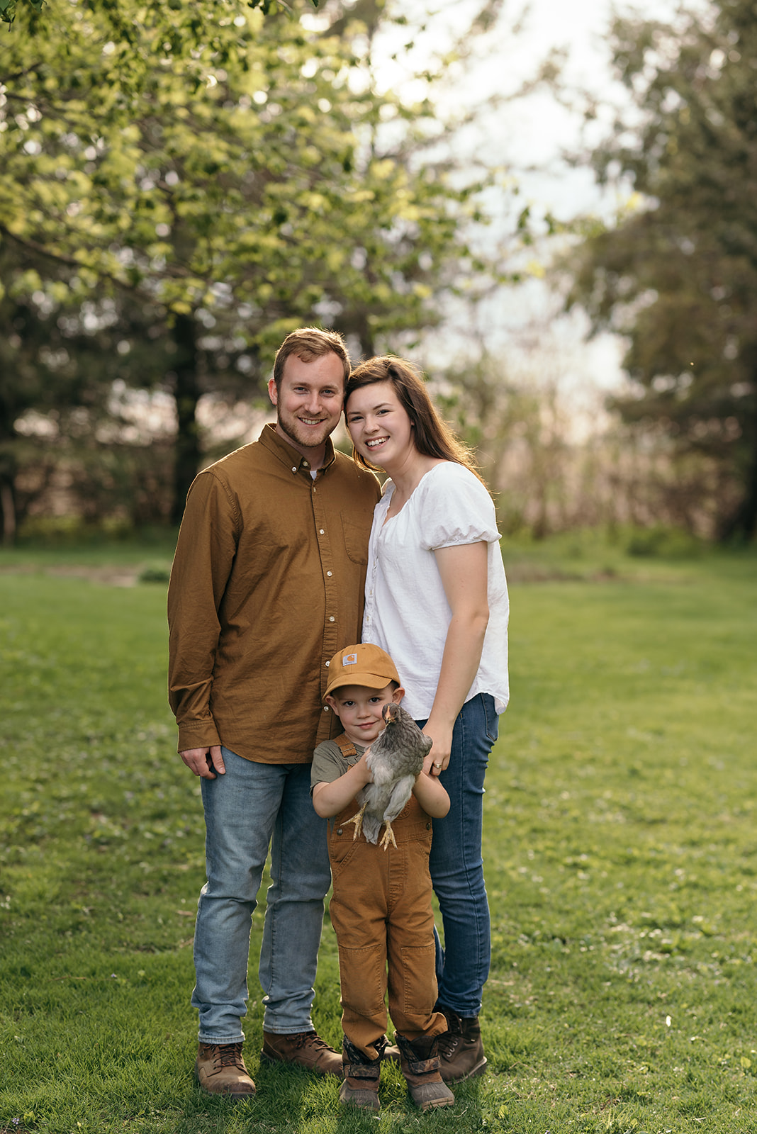 couple-on-farm-wellman-iowa-engagement-session