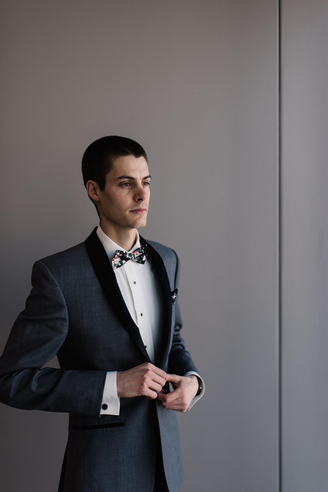 groom buttoning tuxedo St. Paul's United Methodist Church Wedding