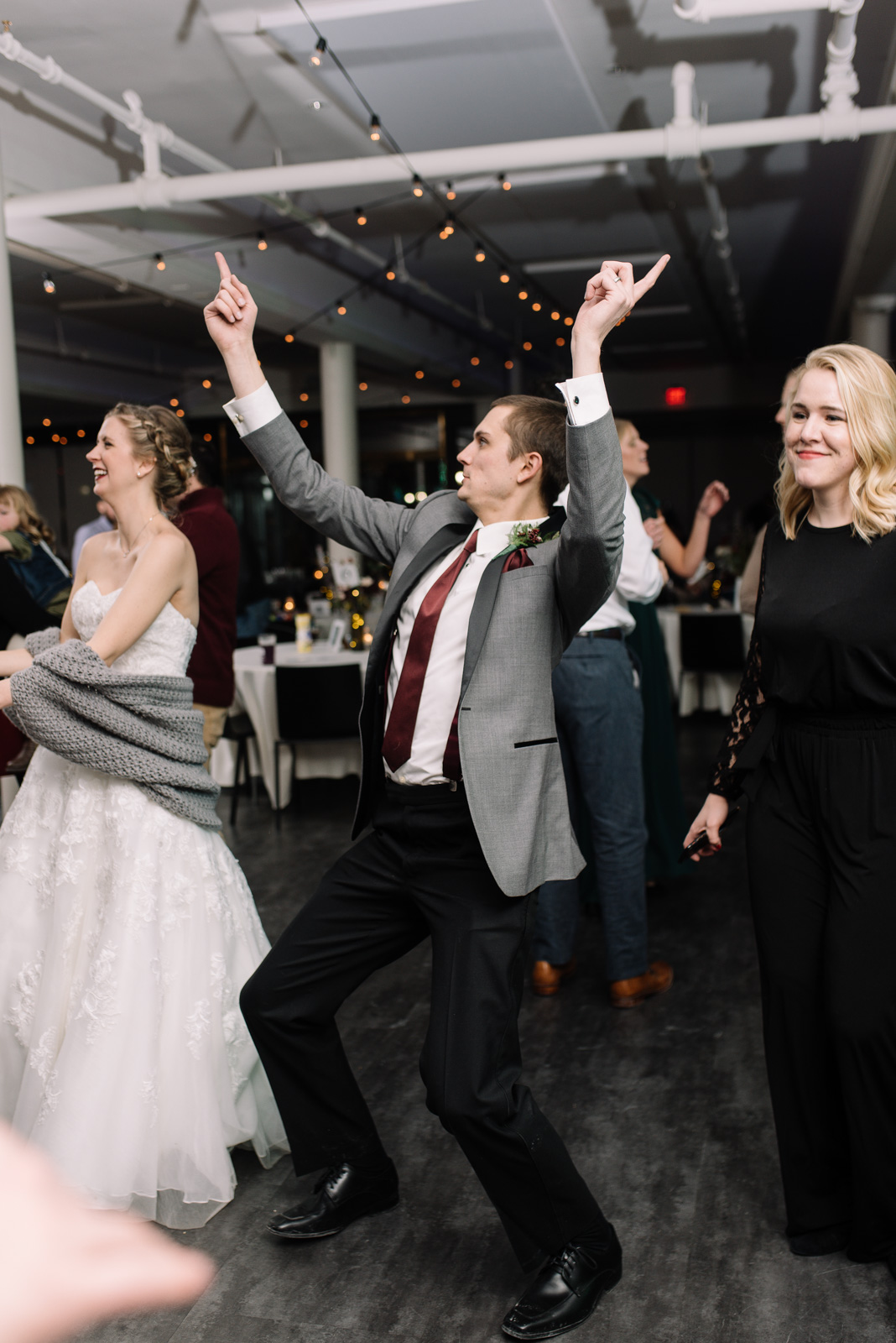 wedding guests dancing eastbank wedding venue bistro lights