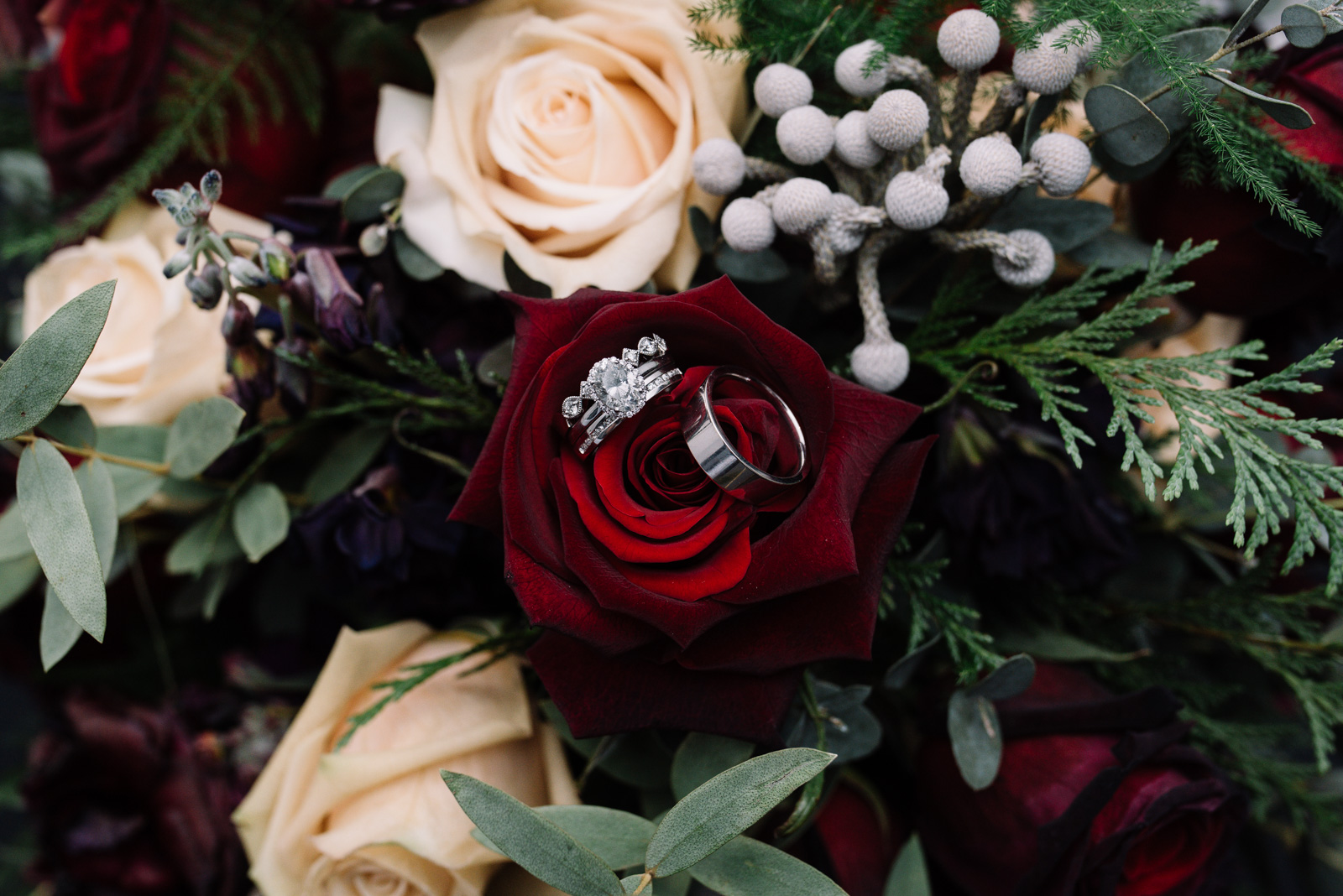 wedding rings in flower bouquet eastbank wedding