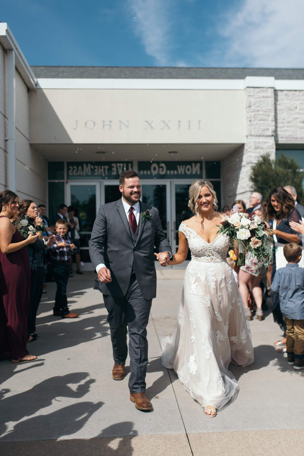 bubble exit St. John XXIII Parish cedar rapids wedding