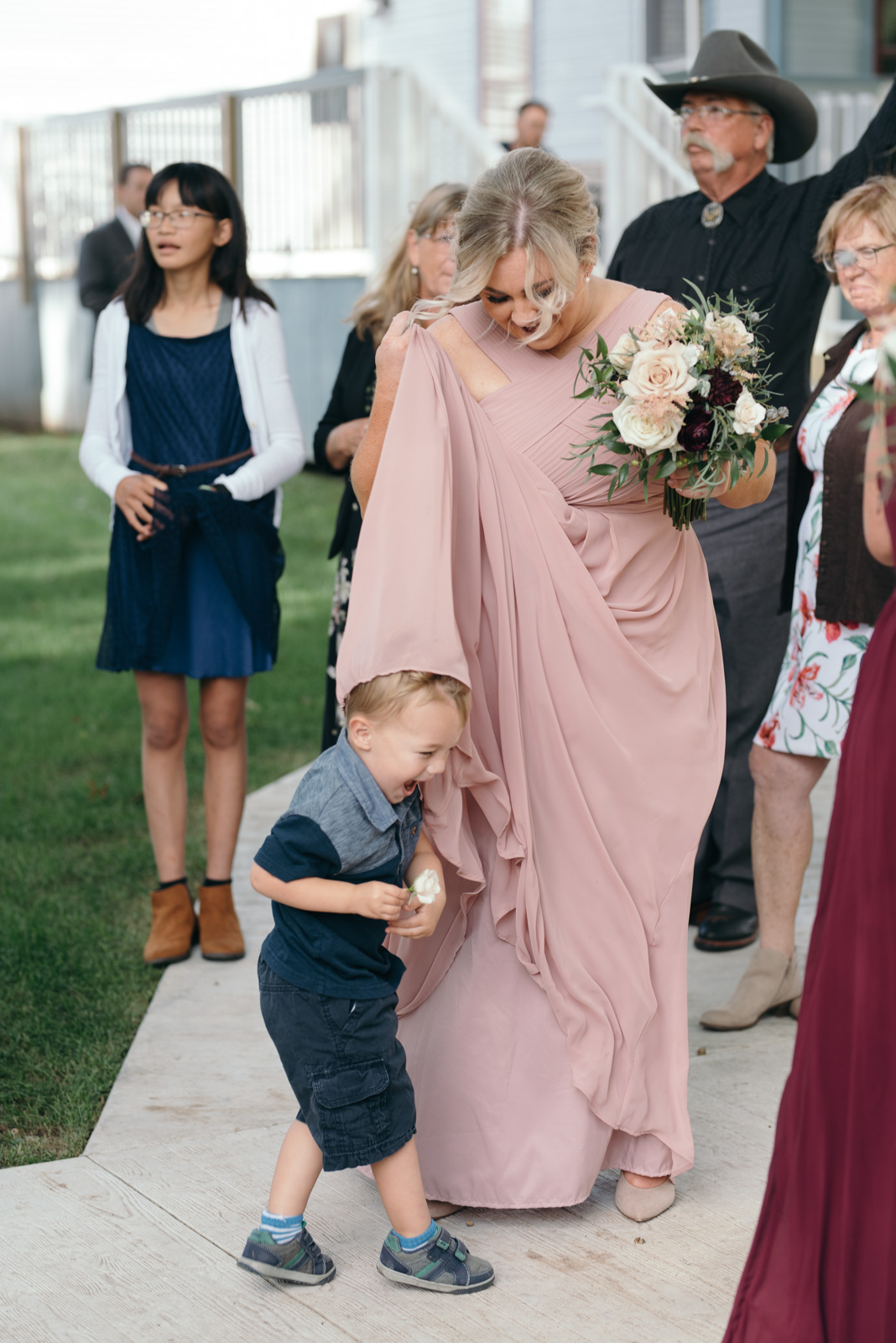 wedding guests outside St. John XXIII Parish wedding