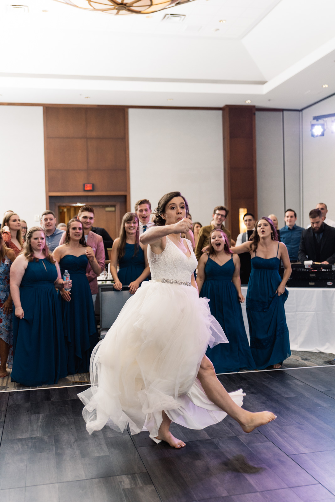 bride in epic dance battle Coralville Marriott Hotel wedding