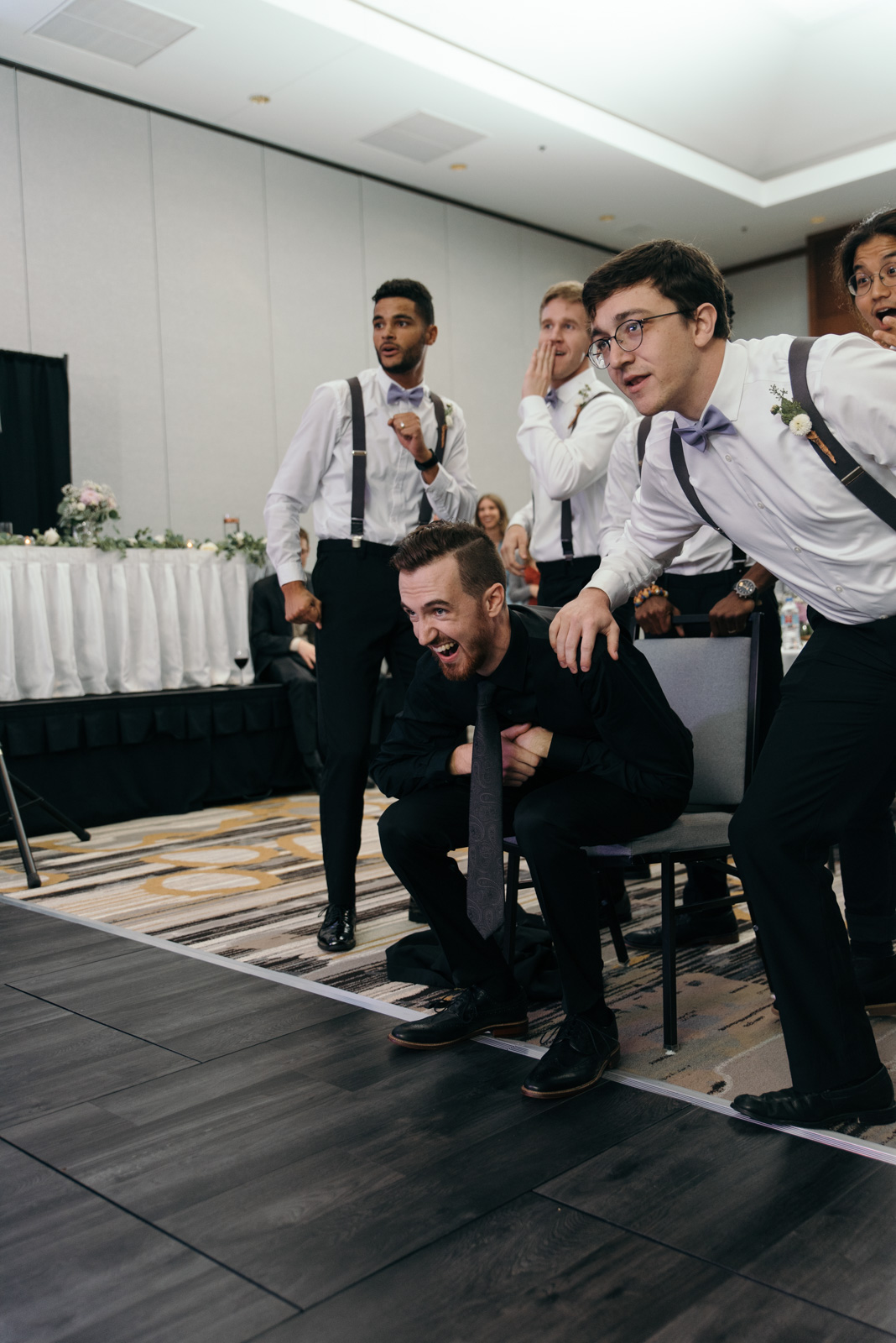 groom at Coralville Marriott Hotel wedding reception