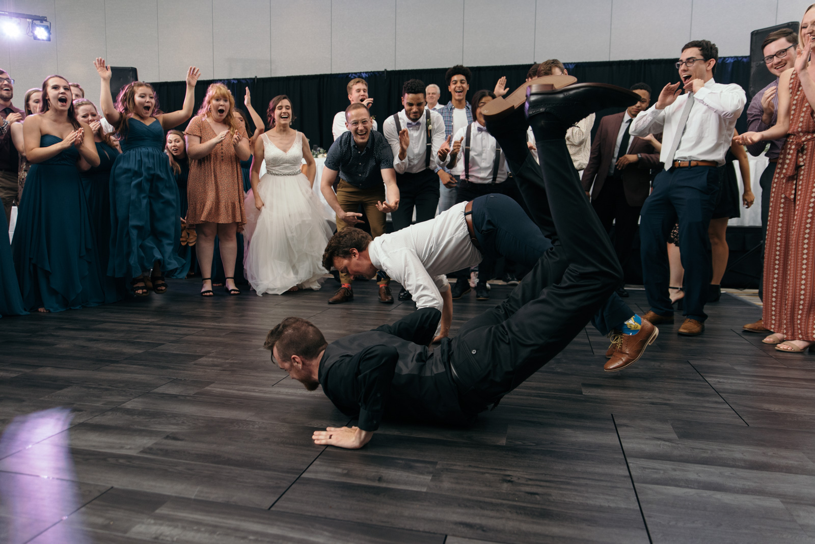 groom and groomsmen dancing coralville wedding reception