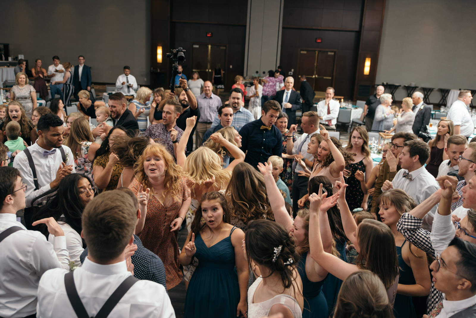 wedding guests dancing at Coralville Marriott Hotel wedding recepition