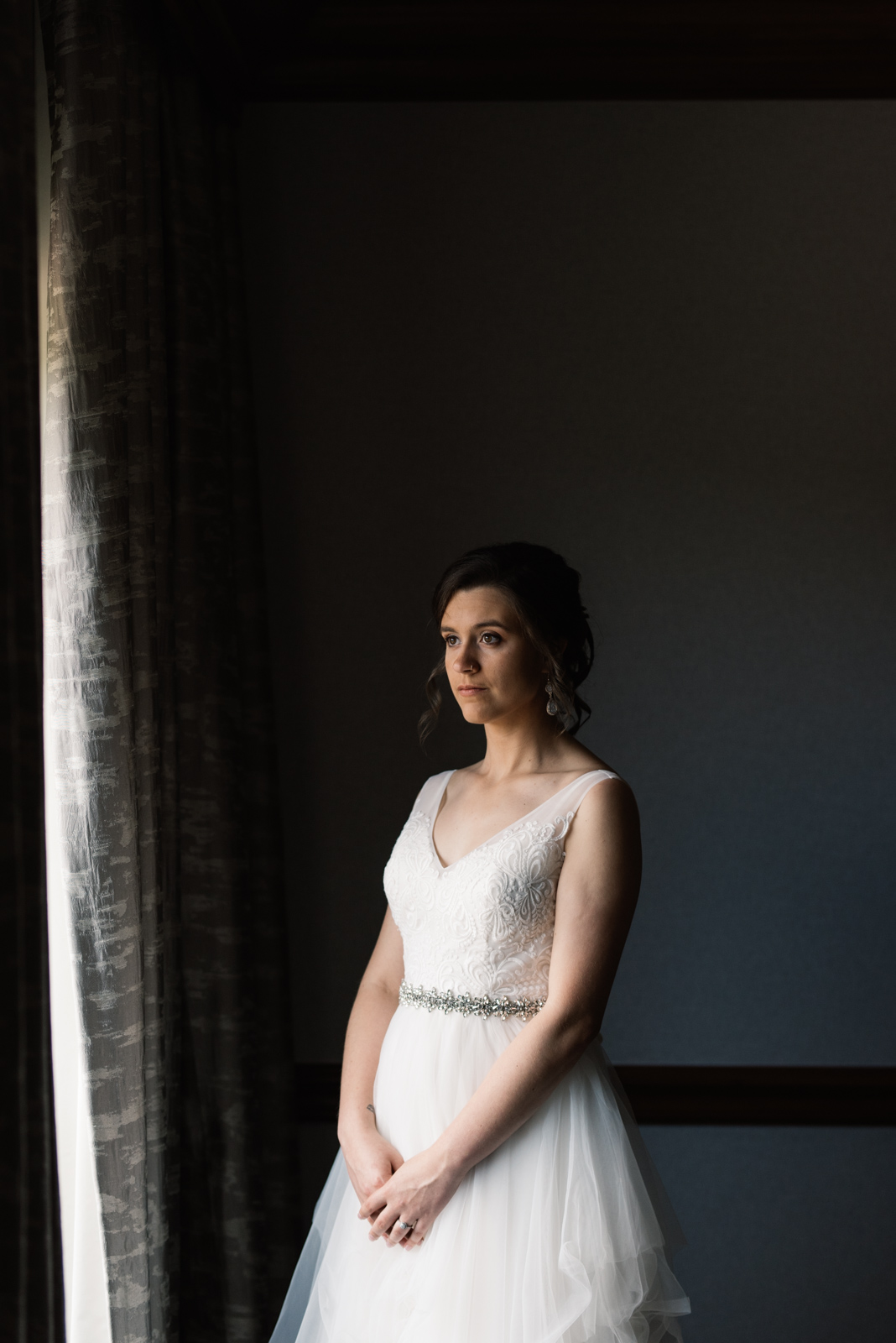 bride in window Coralville Iowa August Wedding