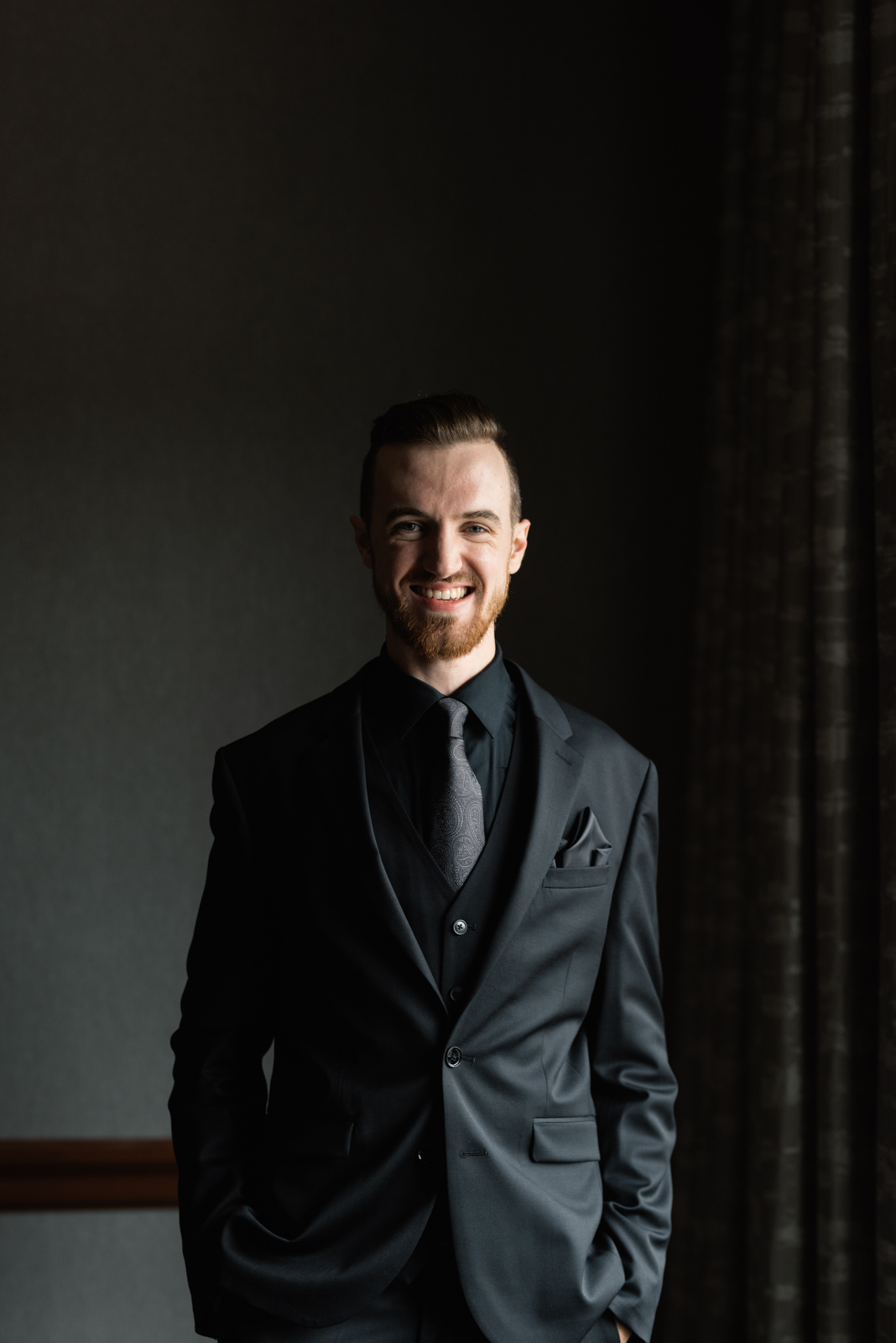 groom smiling august Iowa wedding