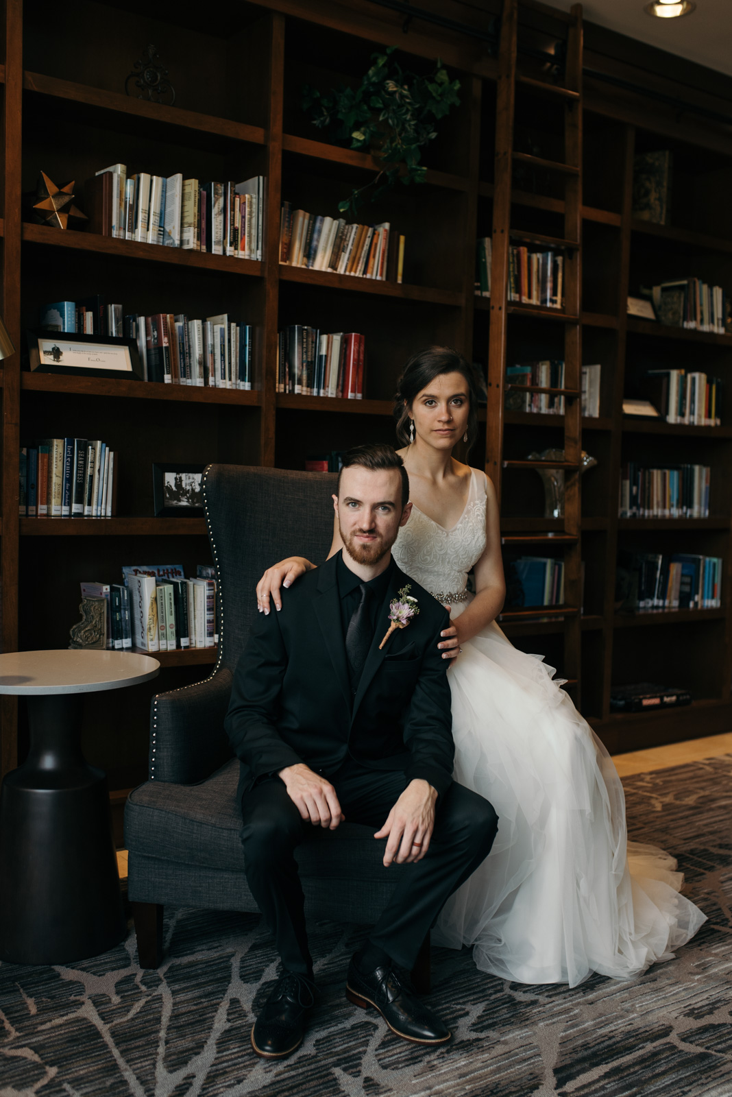 bride and groom in library Coralville Marriott Hotel Wedding