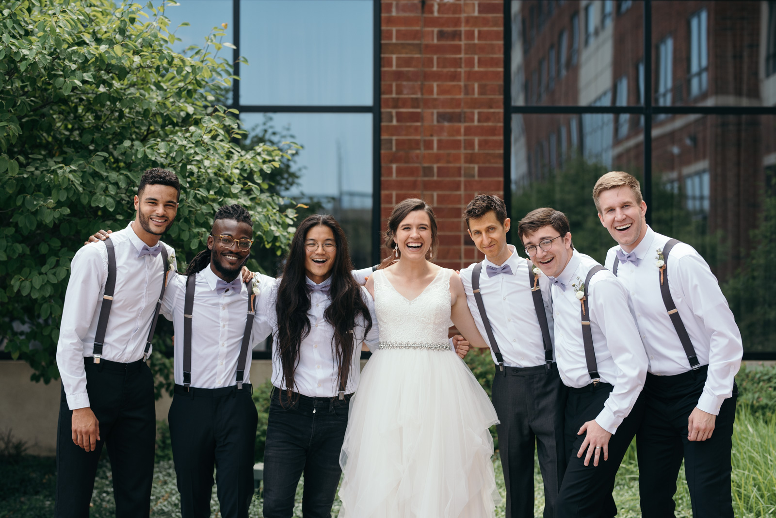 bride with groomsmen Coralville Marriott Hotel Wedding