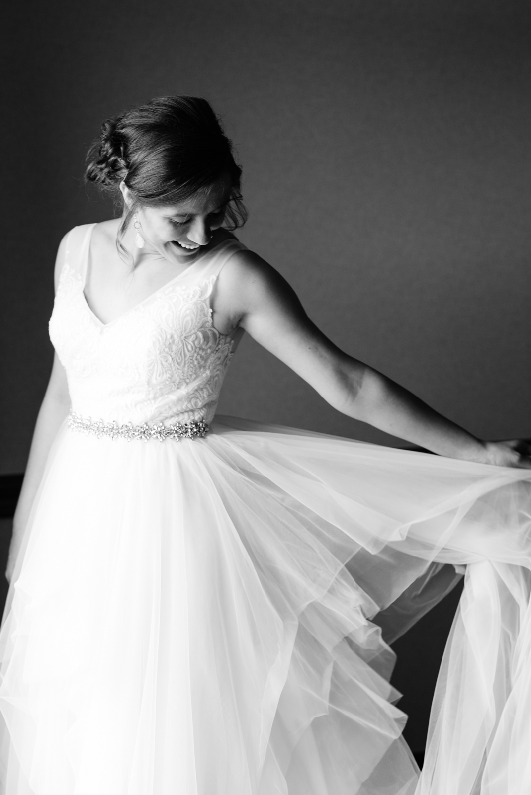 bride playing with wedding dress coralville iowa wedding