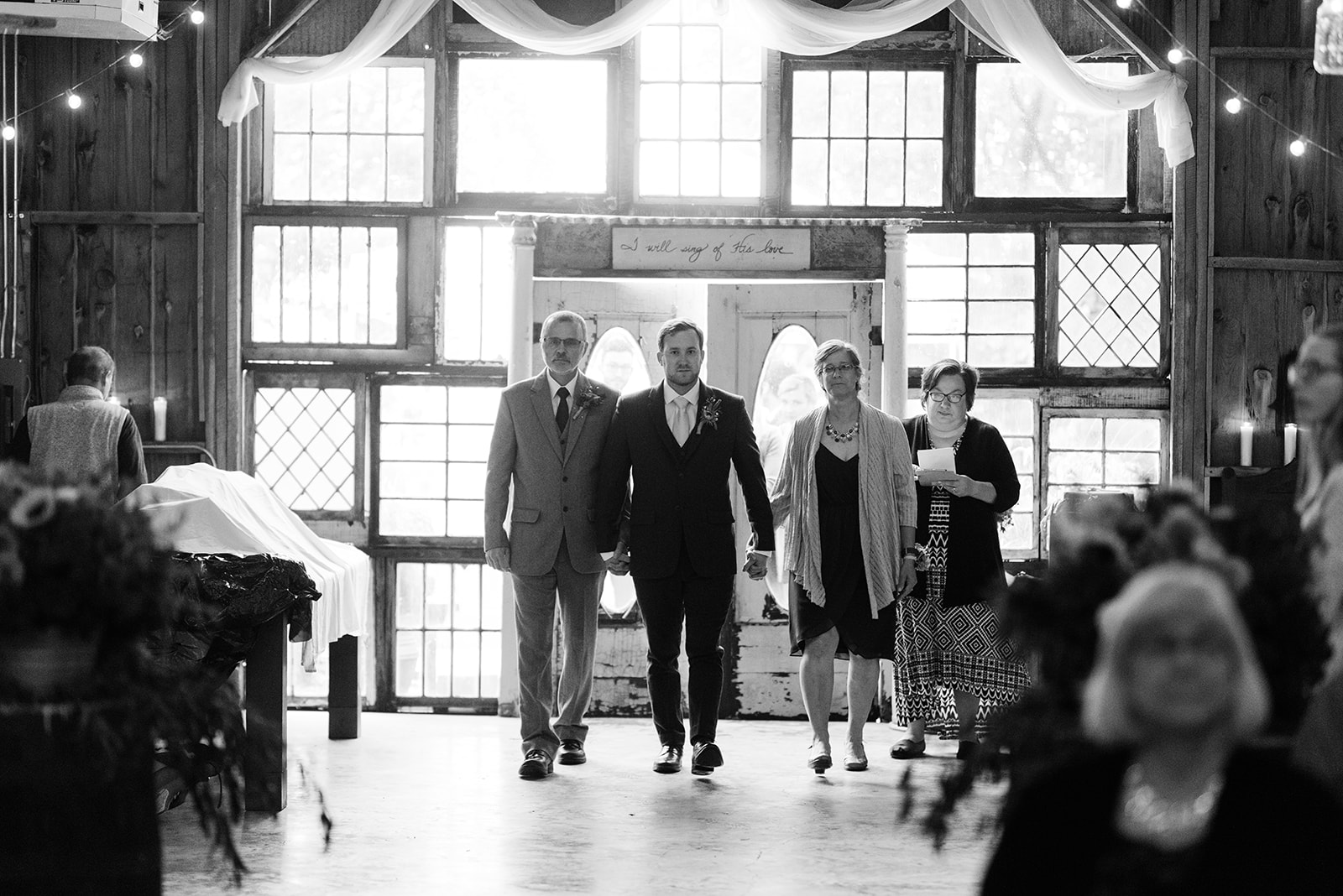 groom walking down the aisle iowa october wedding