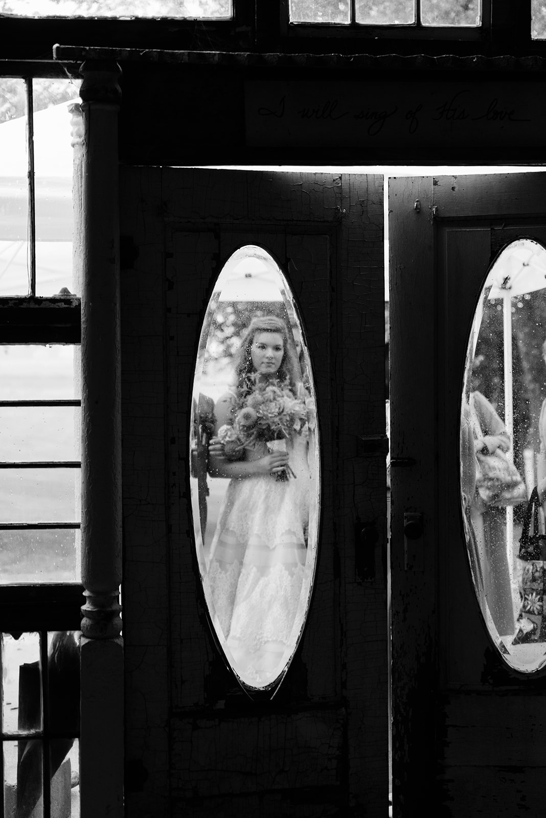 bride waiting outside the barn wedding venue