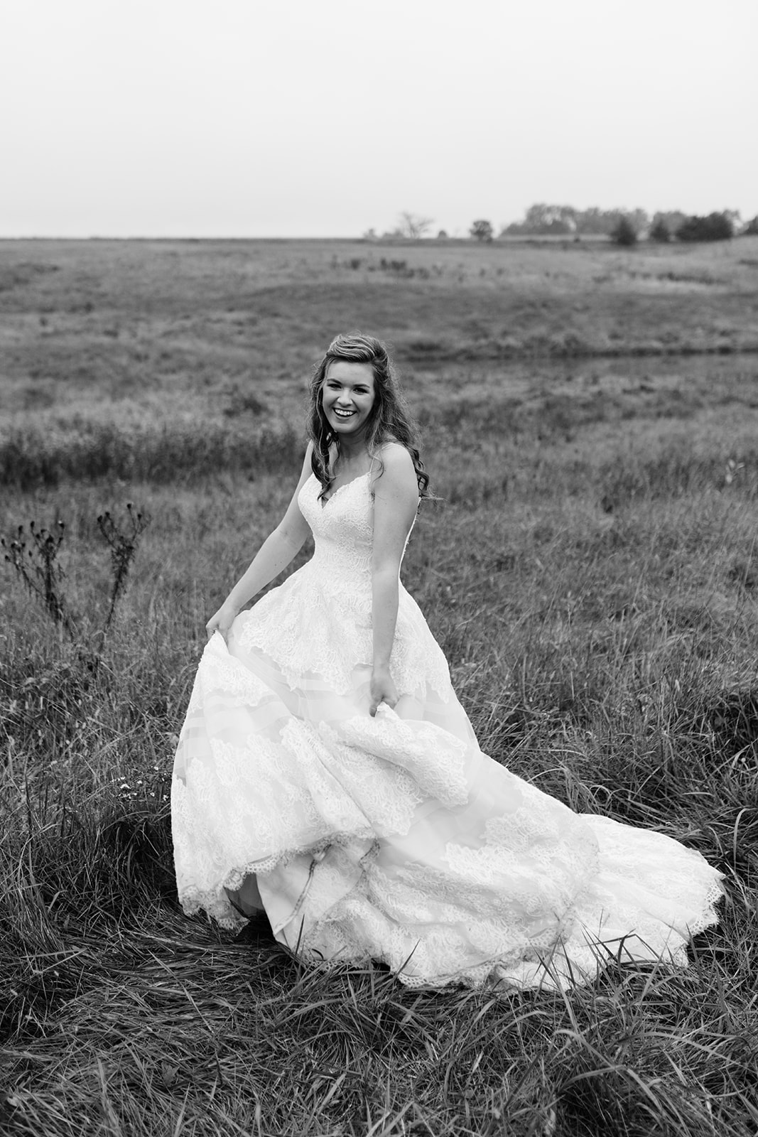 bride in field iowa fall wedding