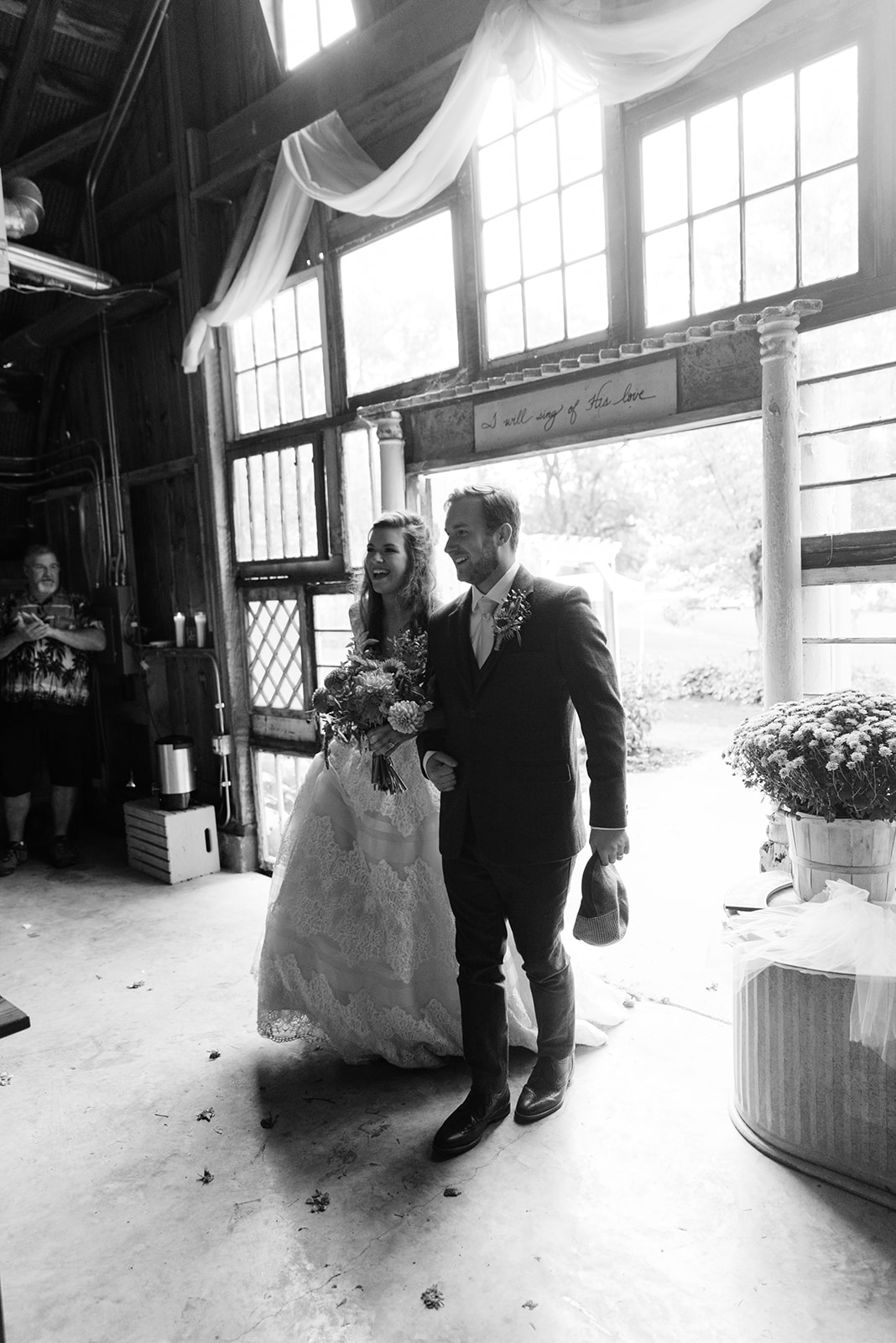 bride and groom grand entrance the barn wedding venue