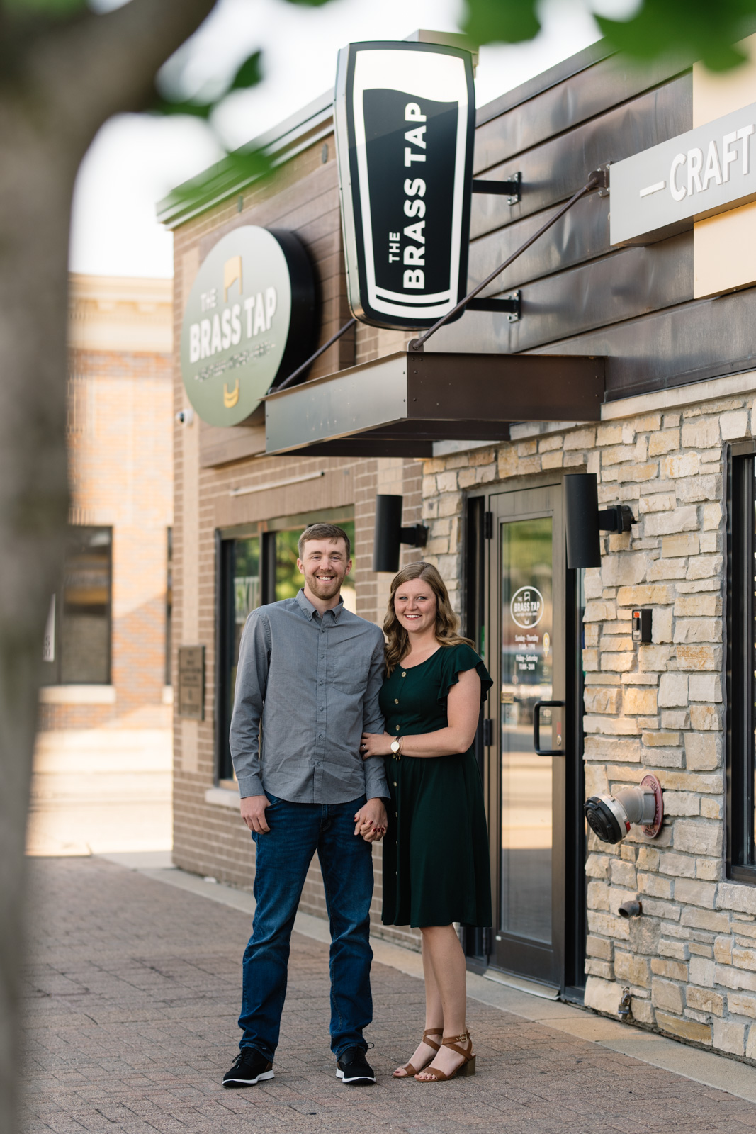 couple outside brass tap cedar falls engagement