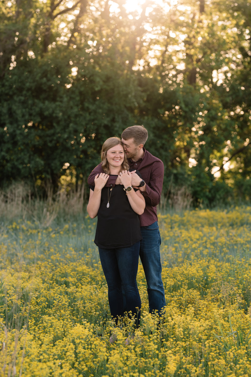 couple cuddling sunset cedar falls June engagement