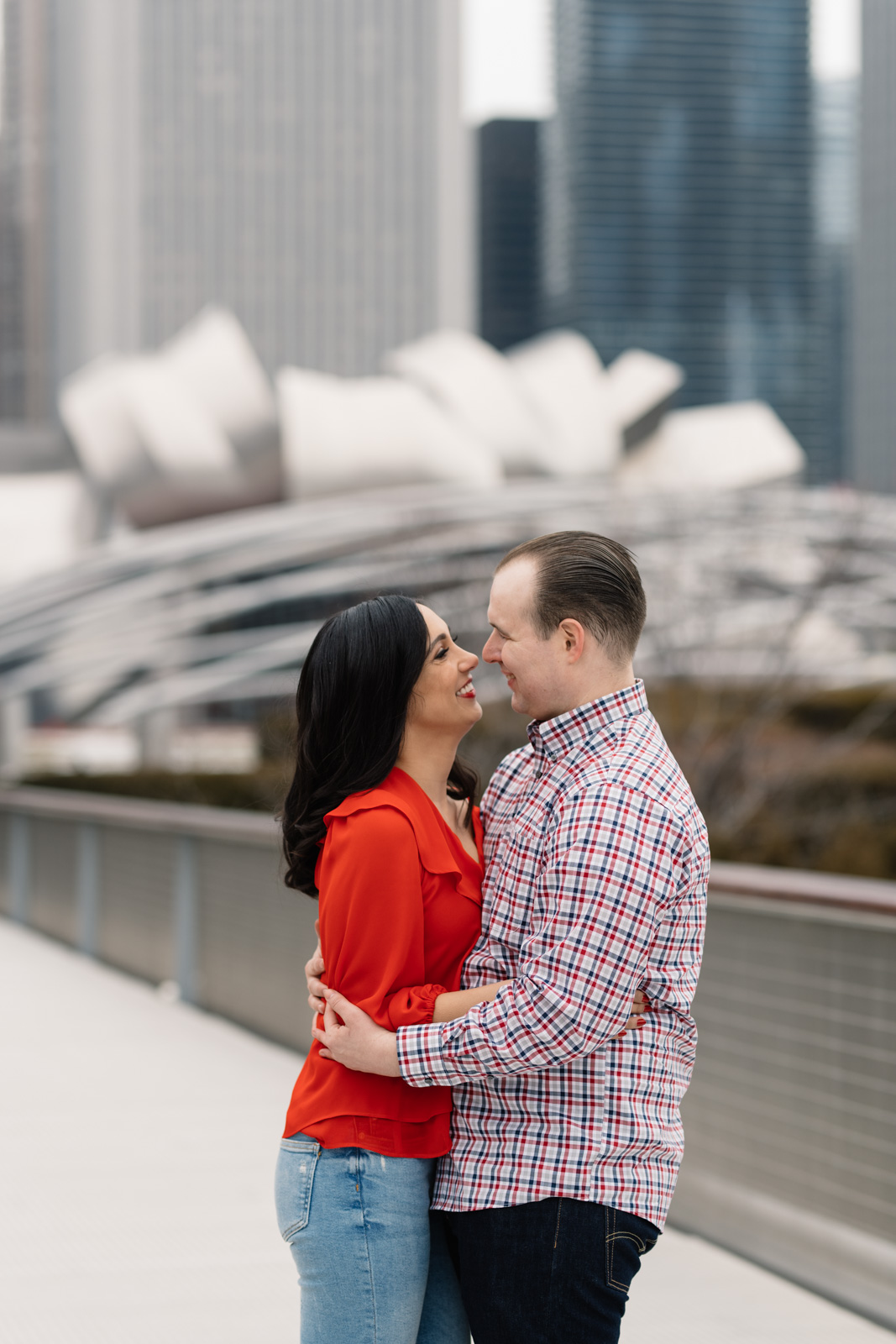 couple smiling downtown chicago engagement session