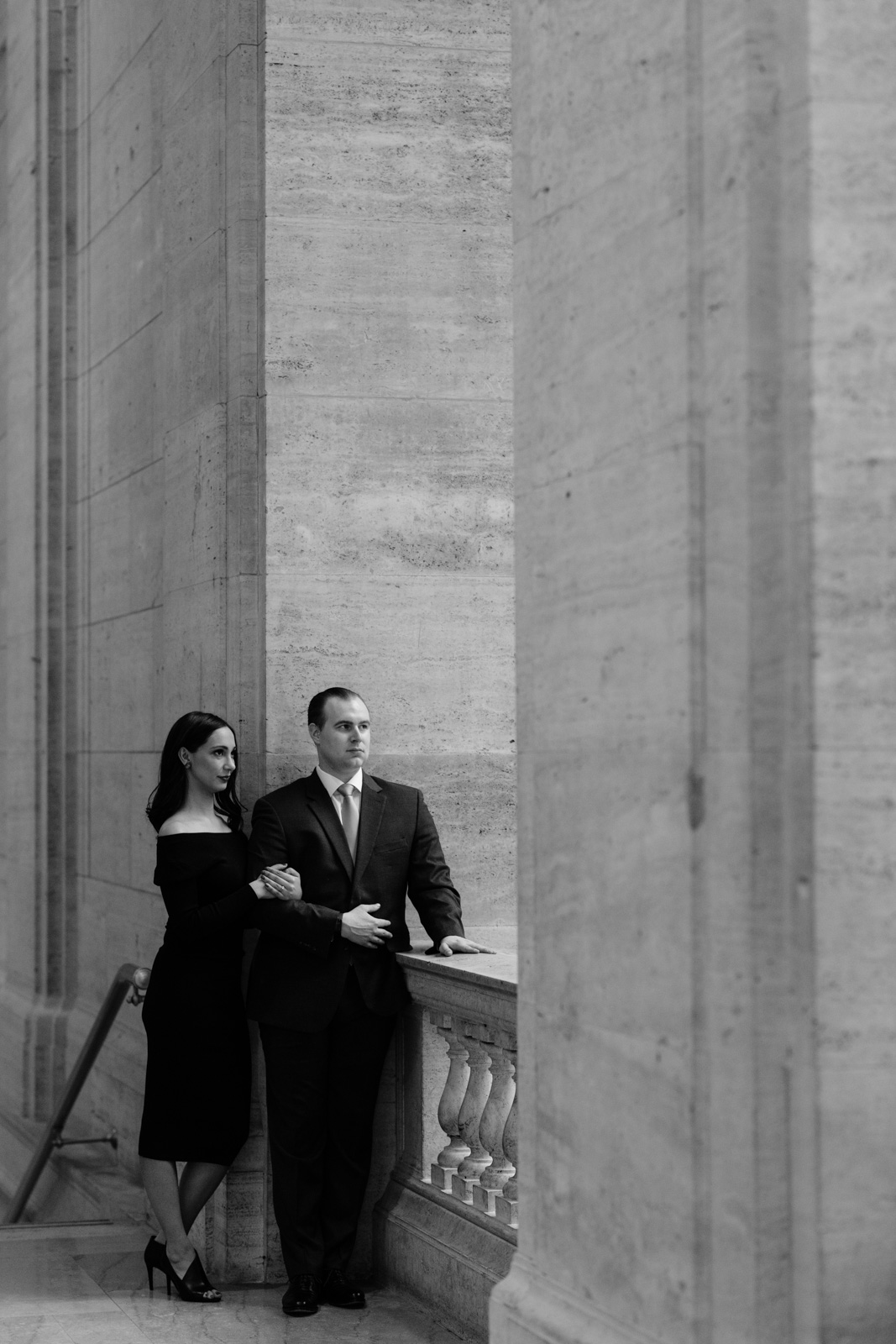 couple cuddling at chicago union station engagement session