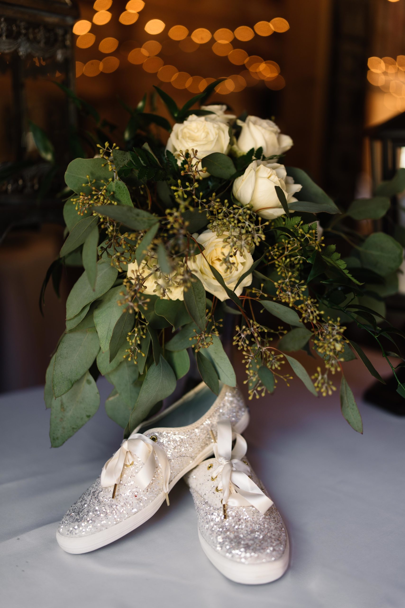 white sparkle Kate Spade Keds wedding shoes with white rose wedding bouquet schafer century farm