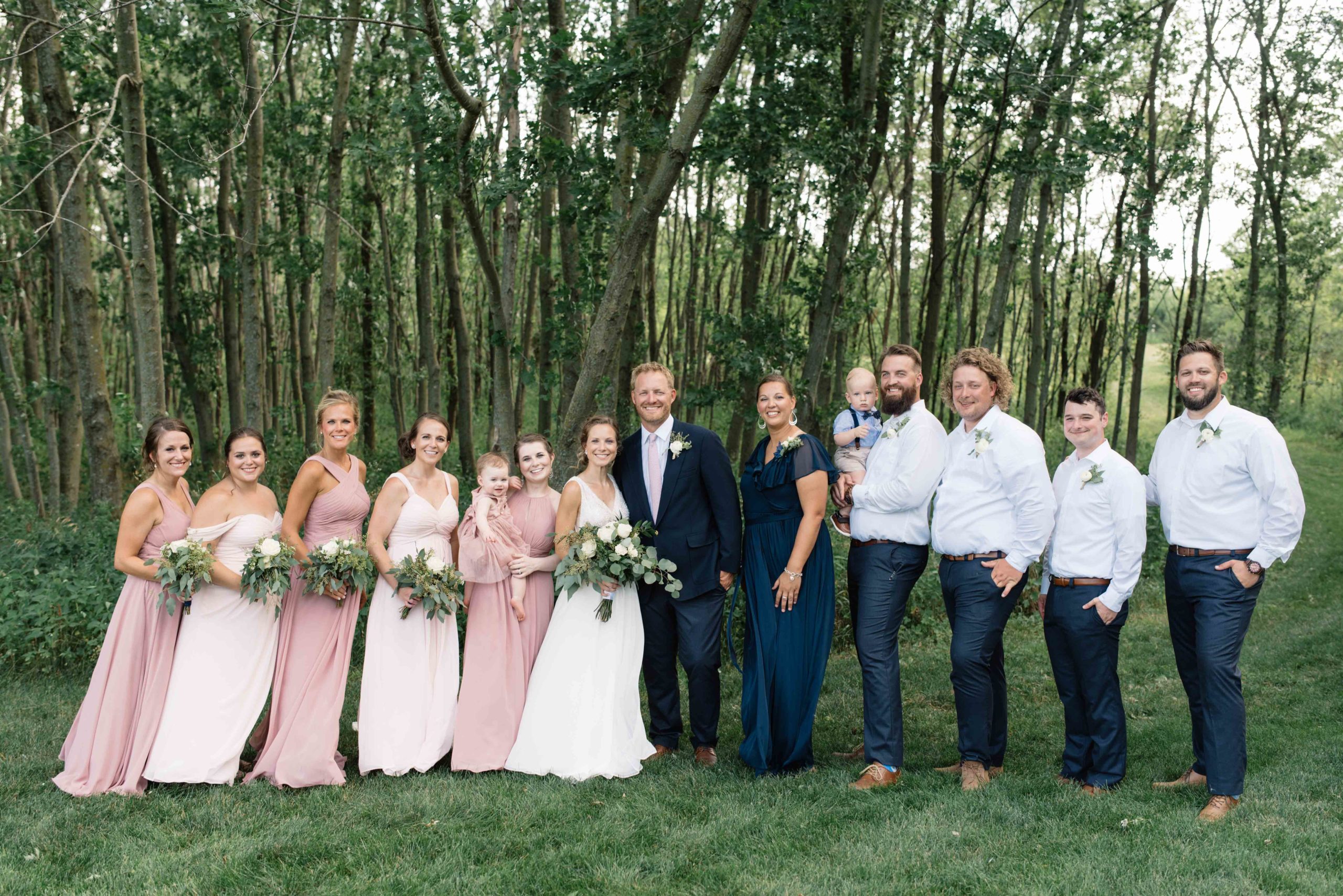 bridal party with bride and groom schafer century farm wedding venue