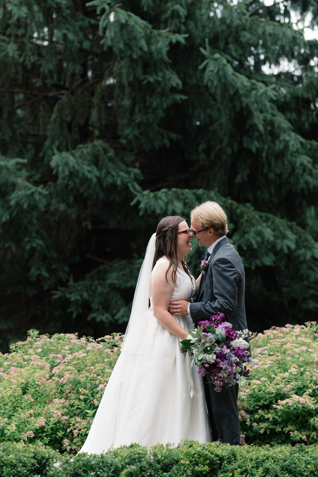 bride and groom in courtyard at wartburg college wedding