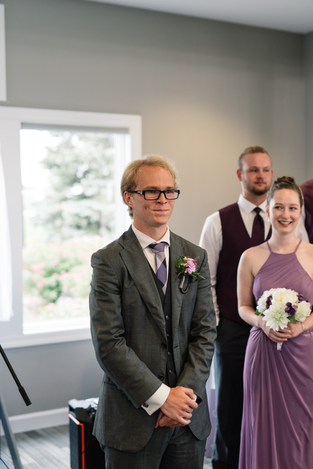 groom during wedding ceremony fox ridge wedding venue