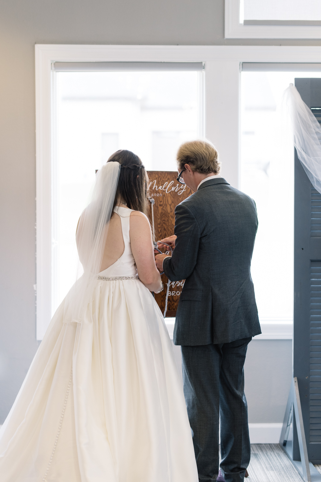 knot ceremony during wedding fox ridge golf course wedding