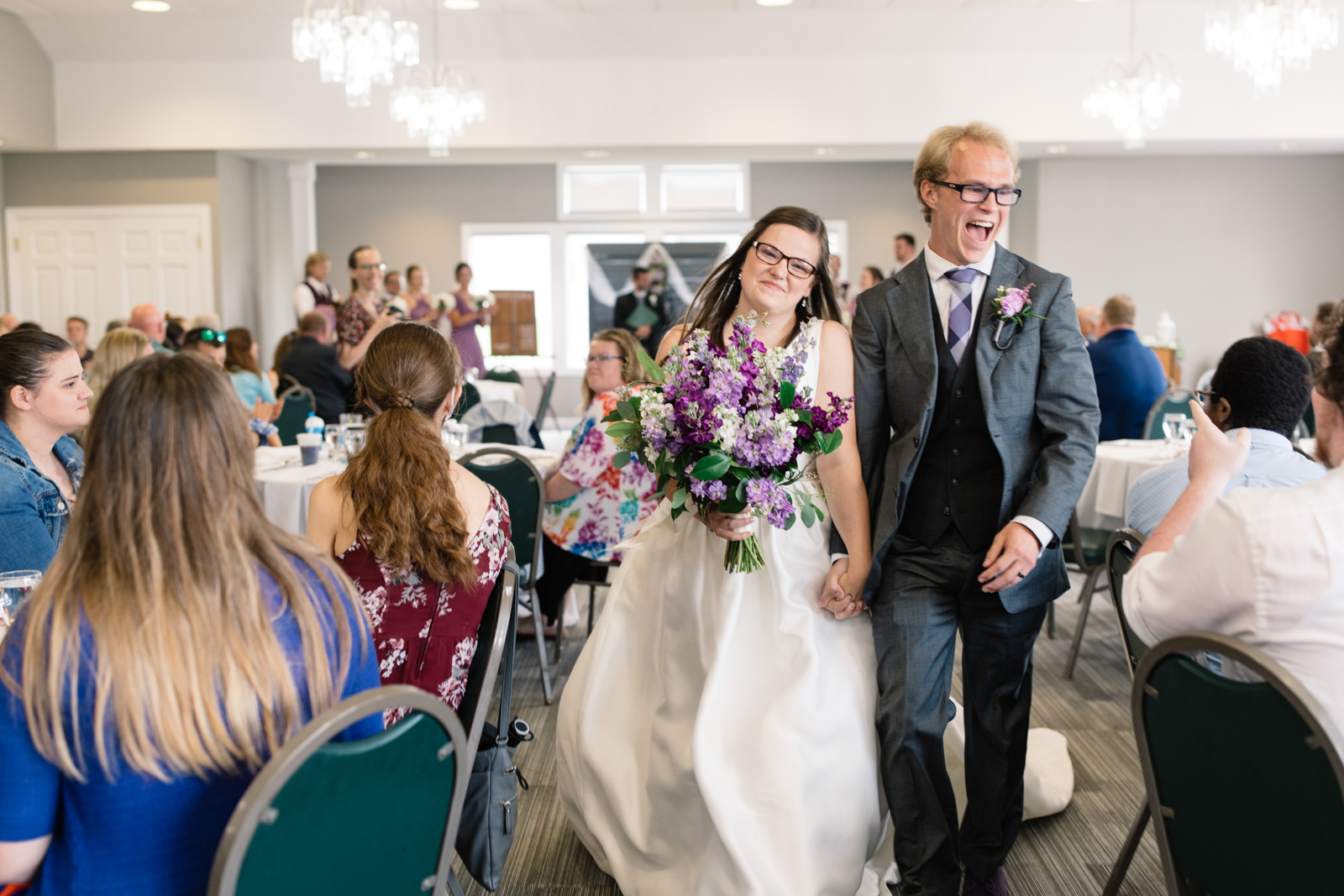 bride and groom walking down the aisle fox ridge golf course wedding venue