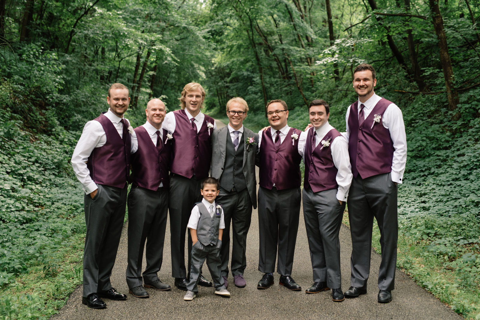 groom with groomsmen iowa june wedding