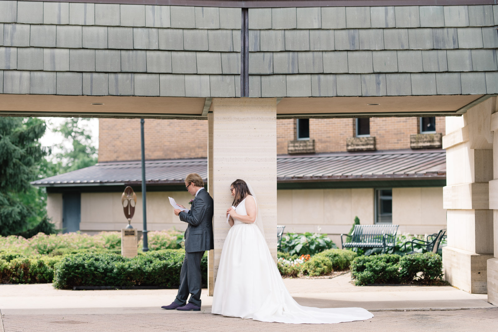 bride and groom read letters to each other wartburg college wedding