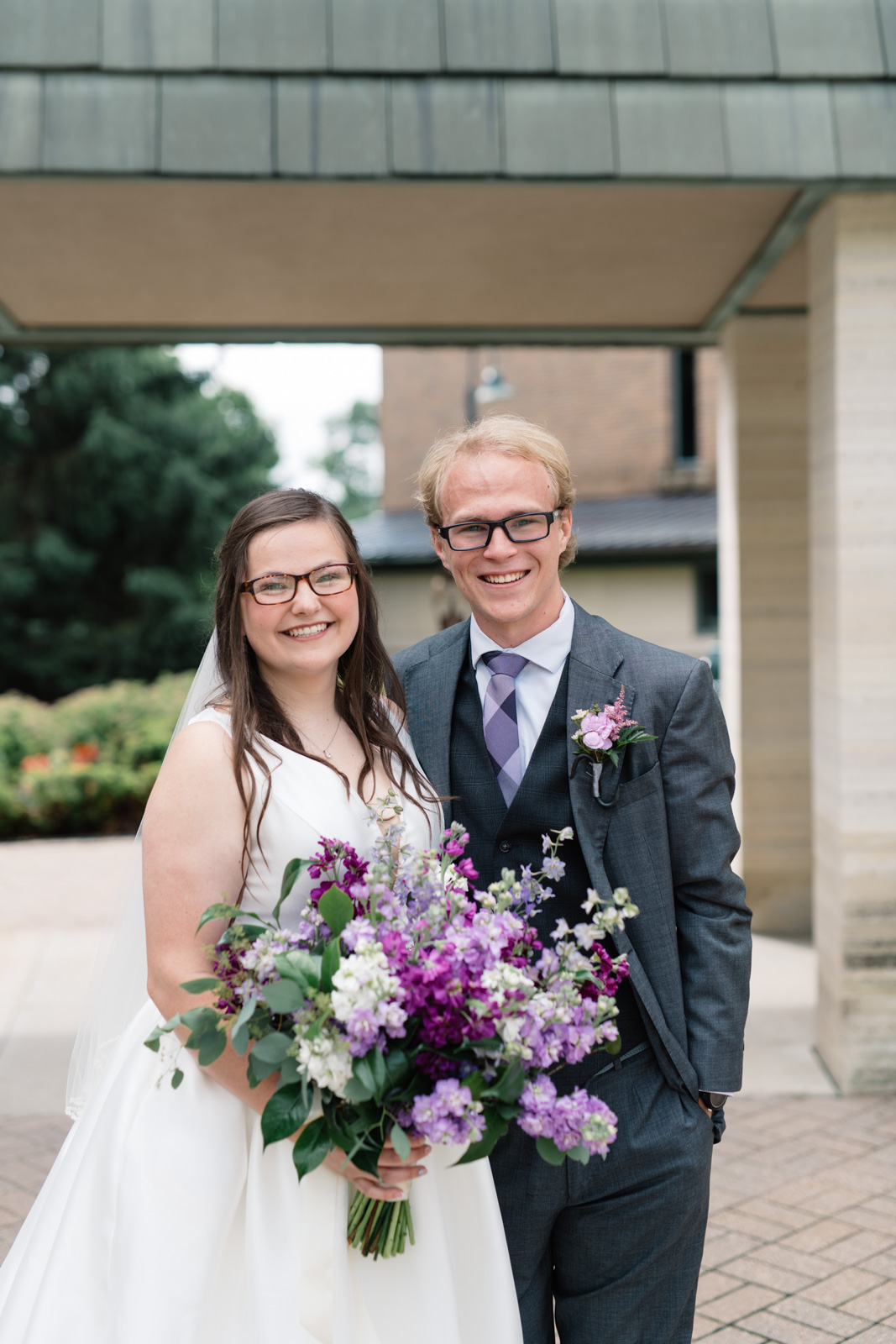 bride and groom holding bridal bouquet waverly wedding