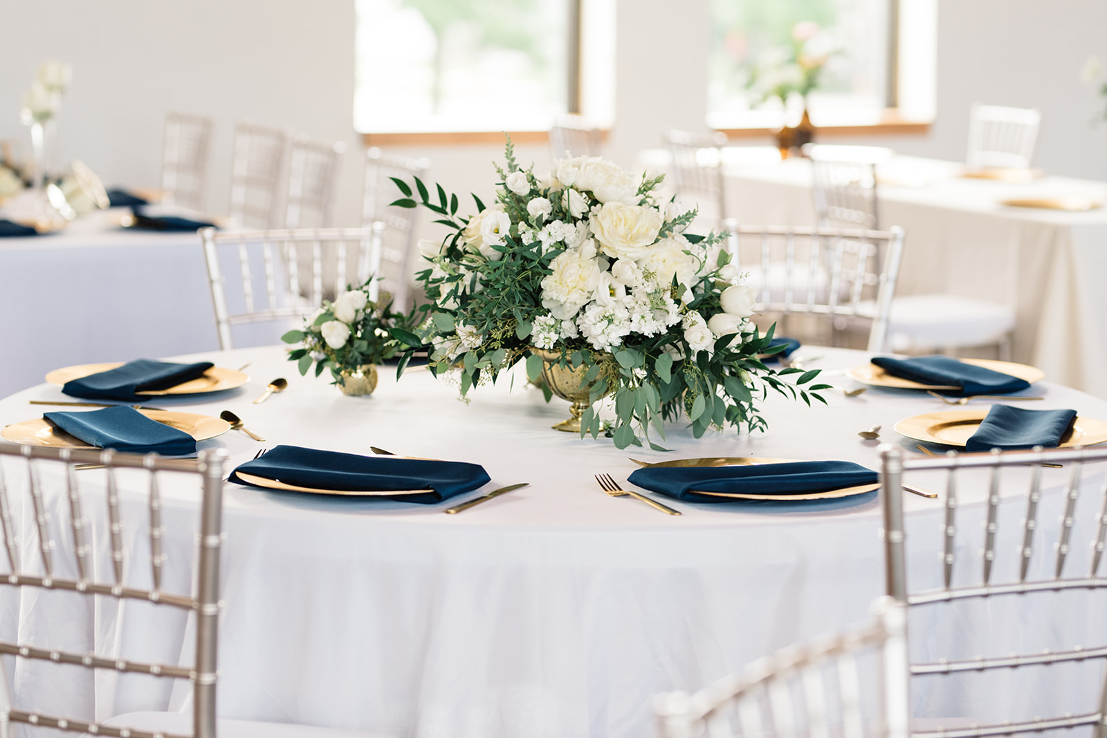 white gold and navy table decor olympic south side theater anne and ellis events