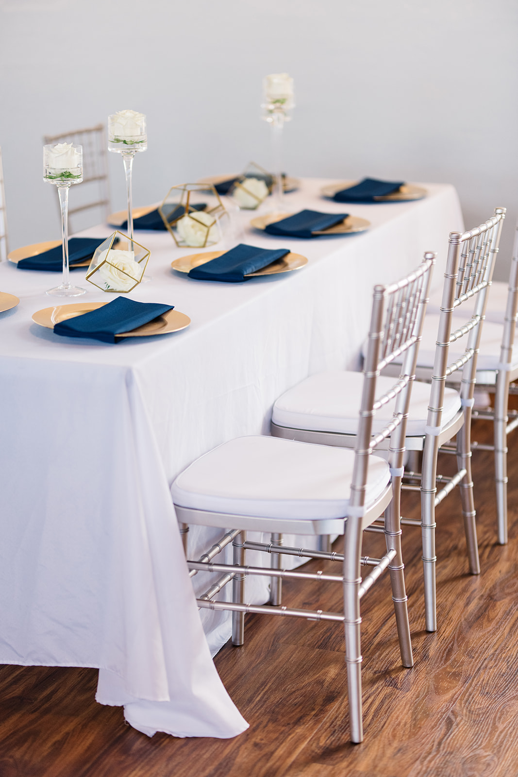 white gold and navy table decor olympic south side theater anne and ellis events