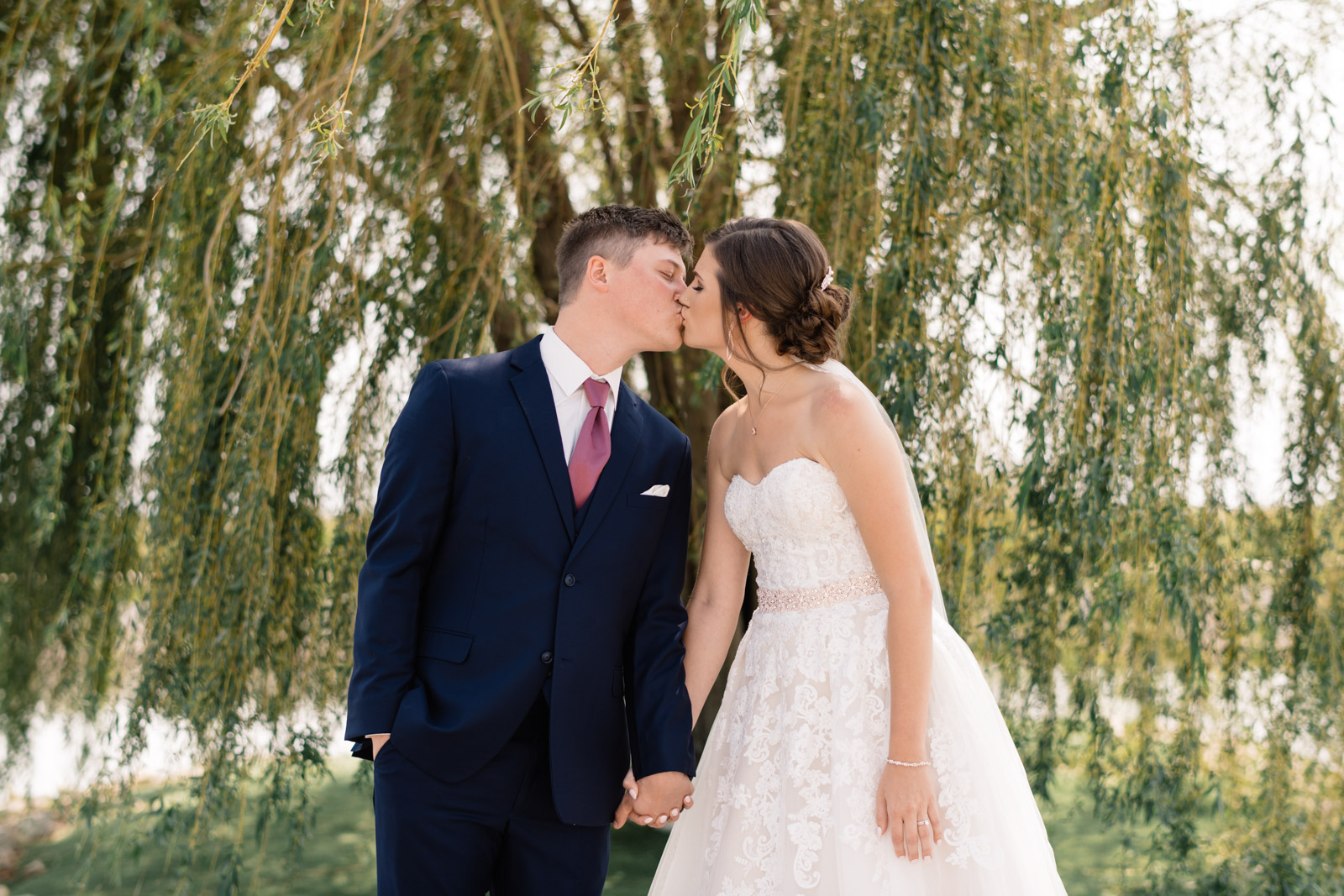 bridesmaids with matching pink robes epic event center wedding venue