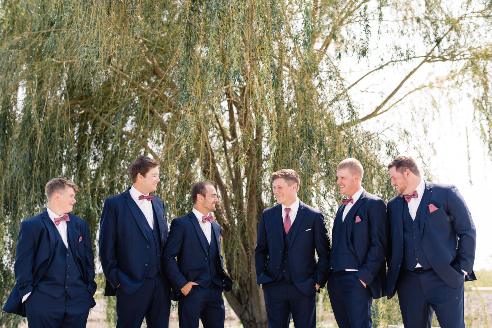 groomsmen in navy suits epic event center wedding venue