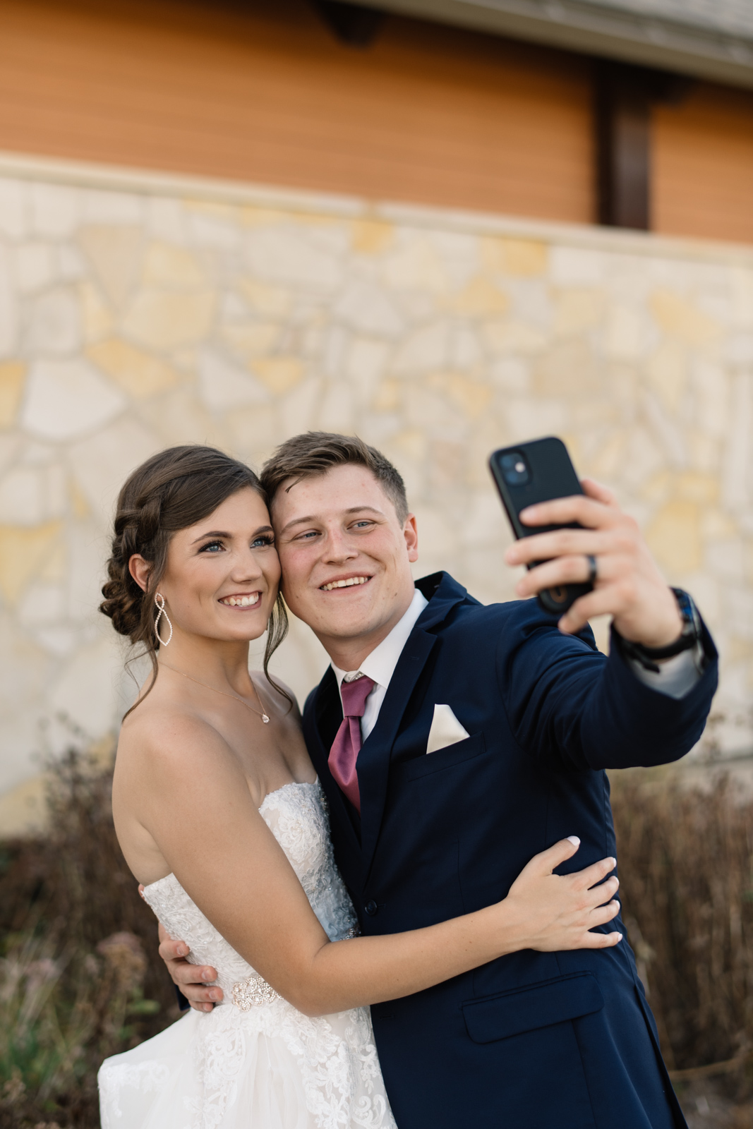 bride and groom taking selfie cedar rapids wedding