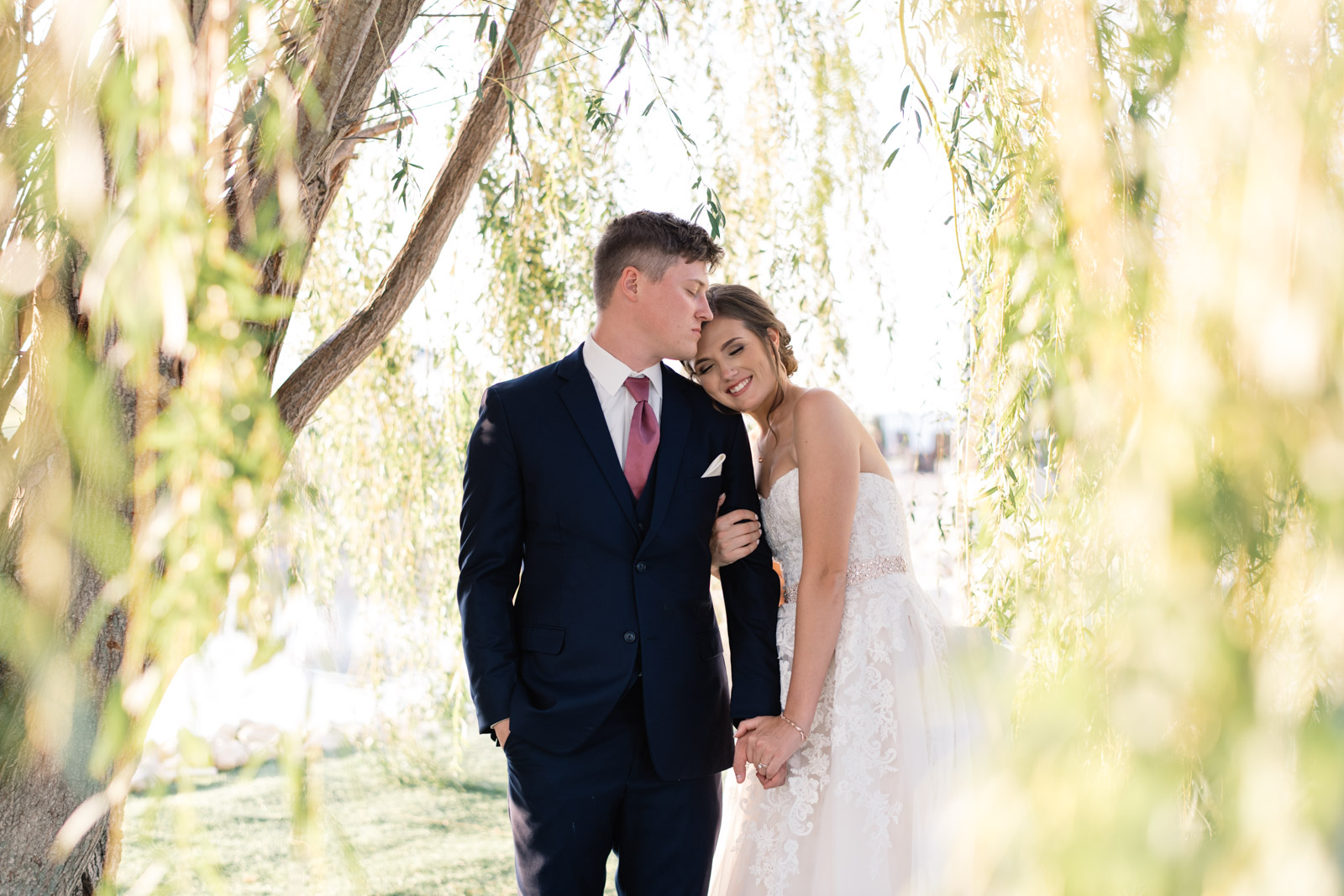 bride and groom at sunset willow tree epic event center cedar rapids wedding venue