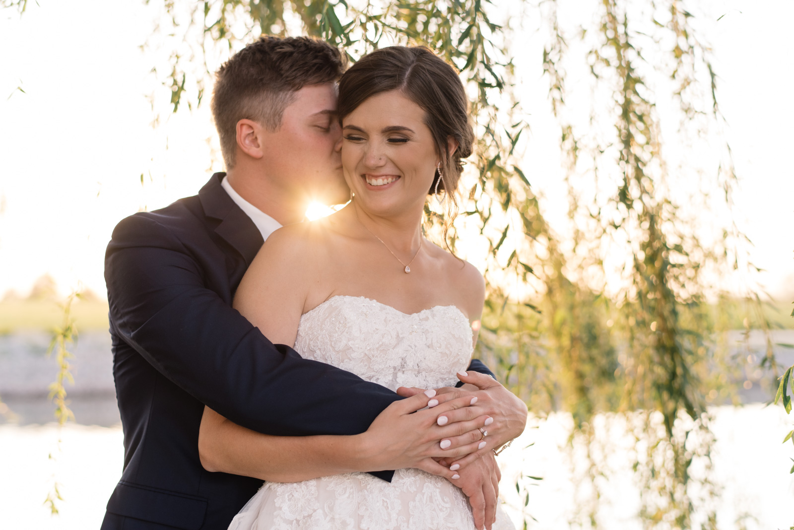 bride and groom at sunset willow tree epic event center cedar rapids wedding venue