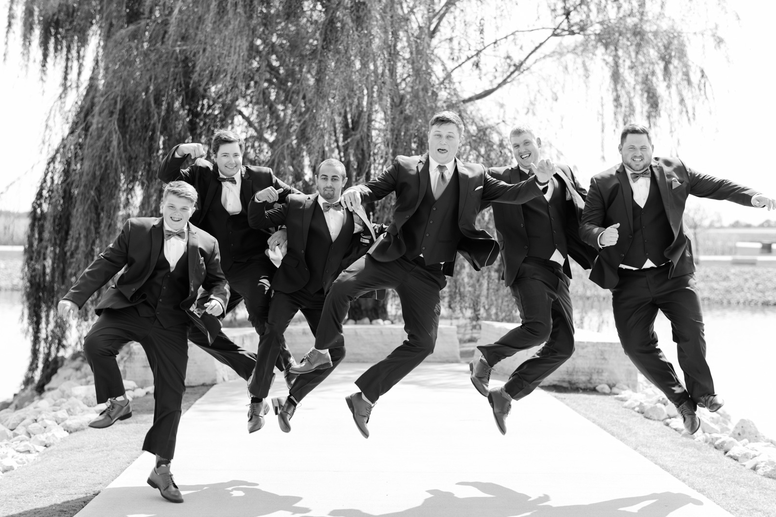 groomsmen in navy suits epic event center wedding venue