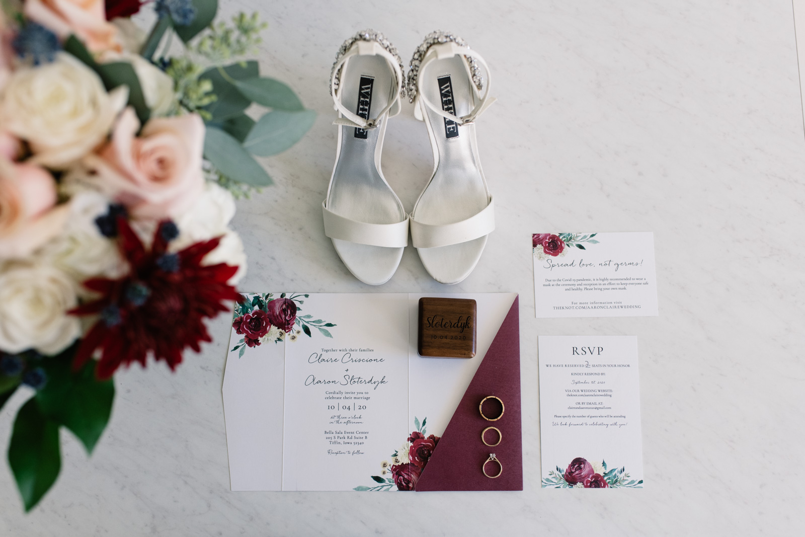 burgundy floral wedding invitation suite with wedding bouquet and shoes bella sala wedding venue tiffin iowa