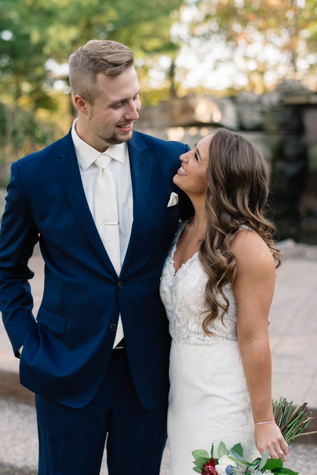 bride and groom outside at bella sala wedding venue in tiffin iowa