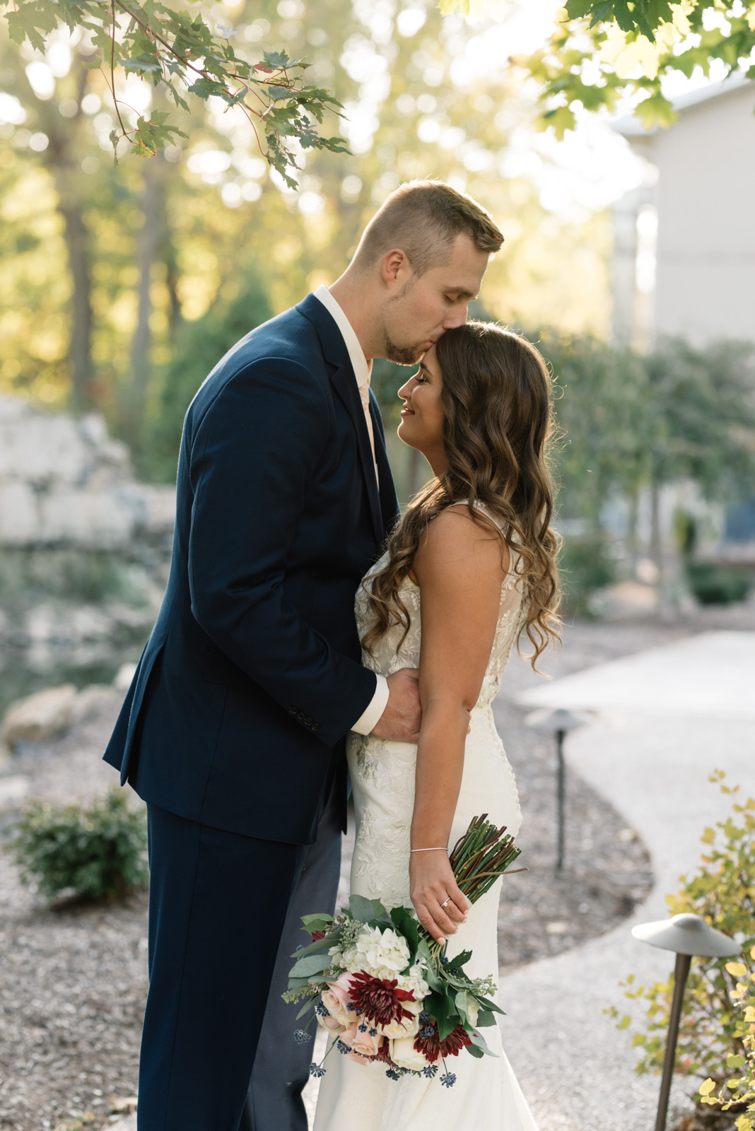 bride and groom outside at bella sala wedding venue in tiffin iowa