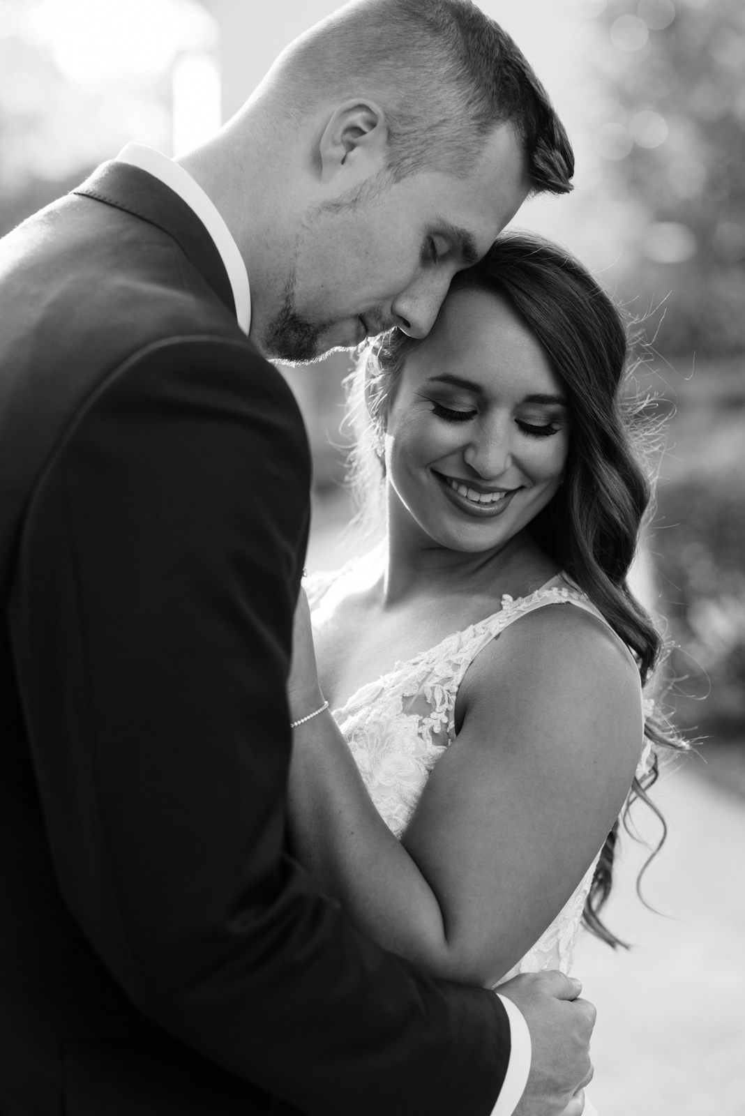 bride and groom outside at bella sala wedding venue in tiffin iowa