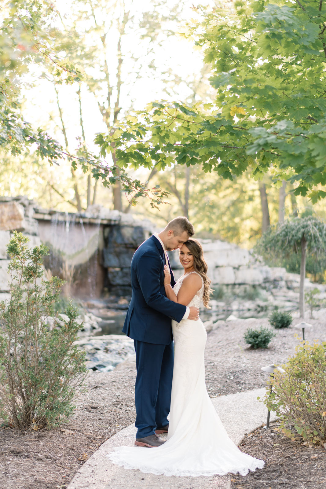 bride and groom outside at bella sala wedding venue in tiffin iowa